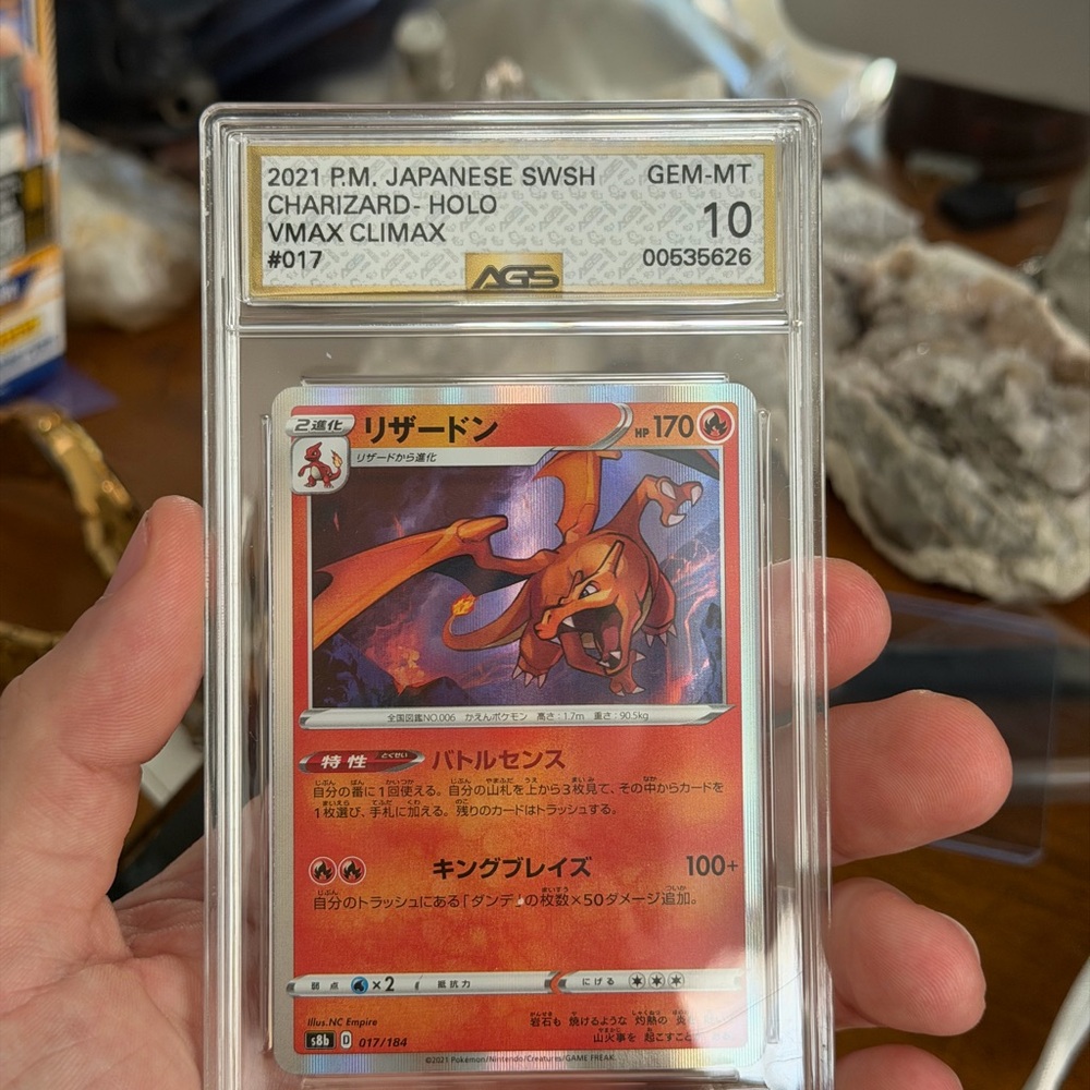 SOLD! Pokemon Charizard Holo Card - Red and Gold